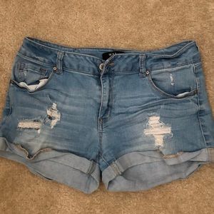 Lights blue ripped shorts